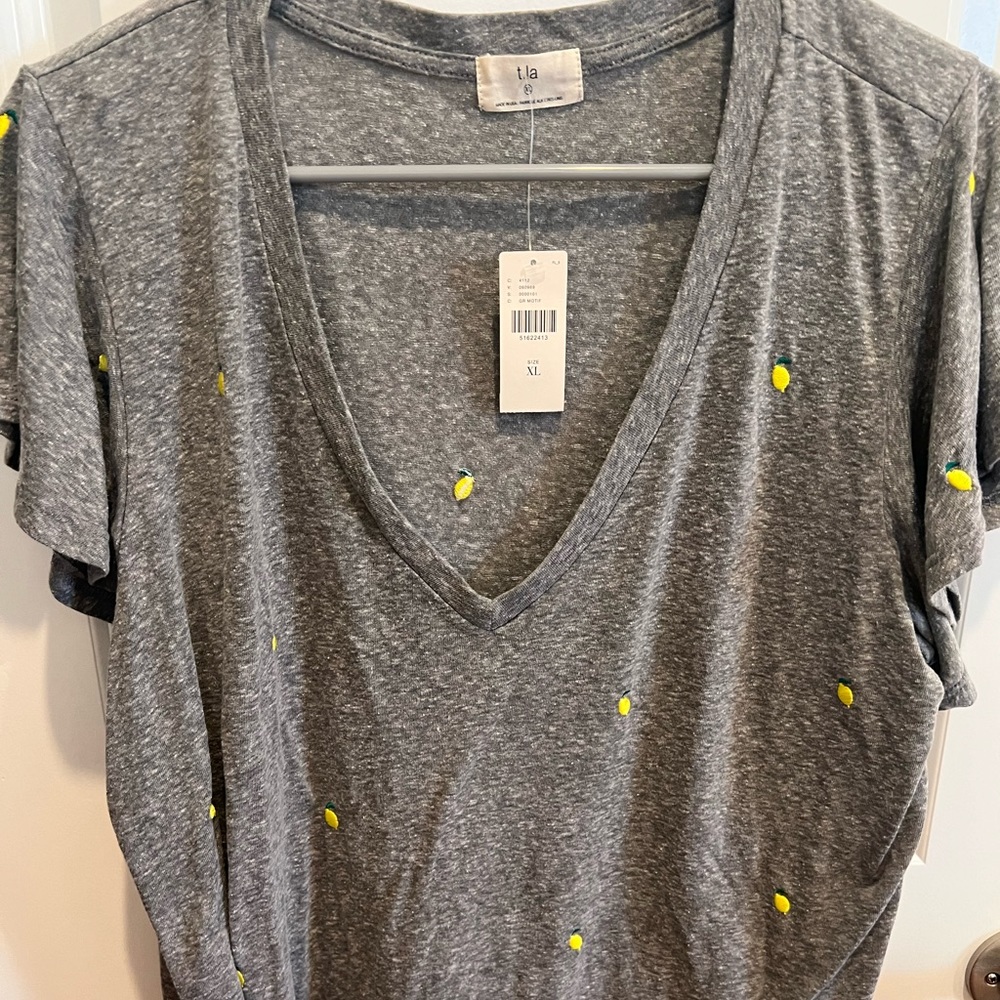 Anthopologie V-neck shirt by T.I.A